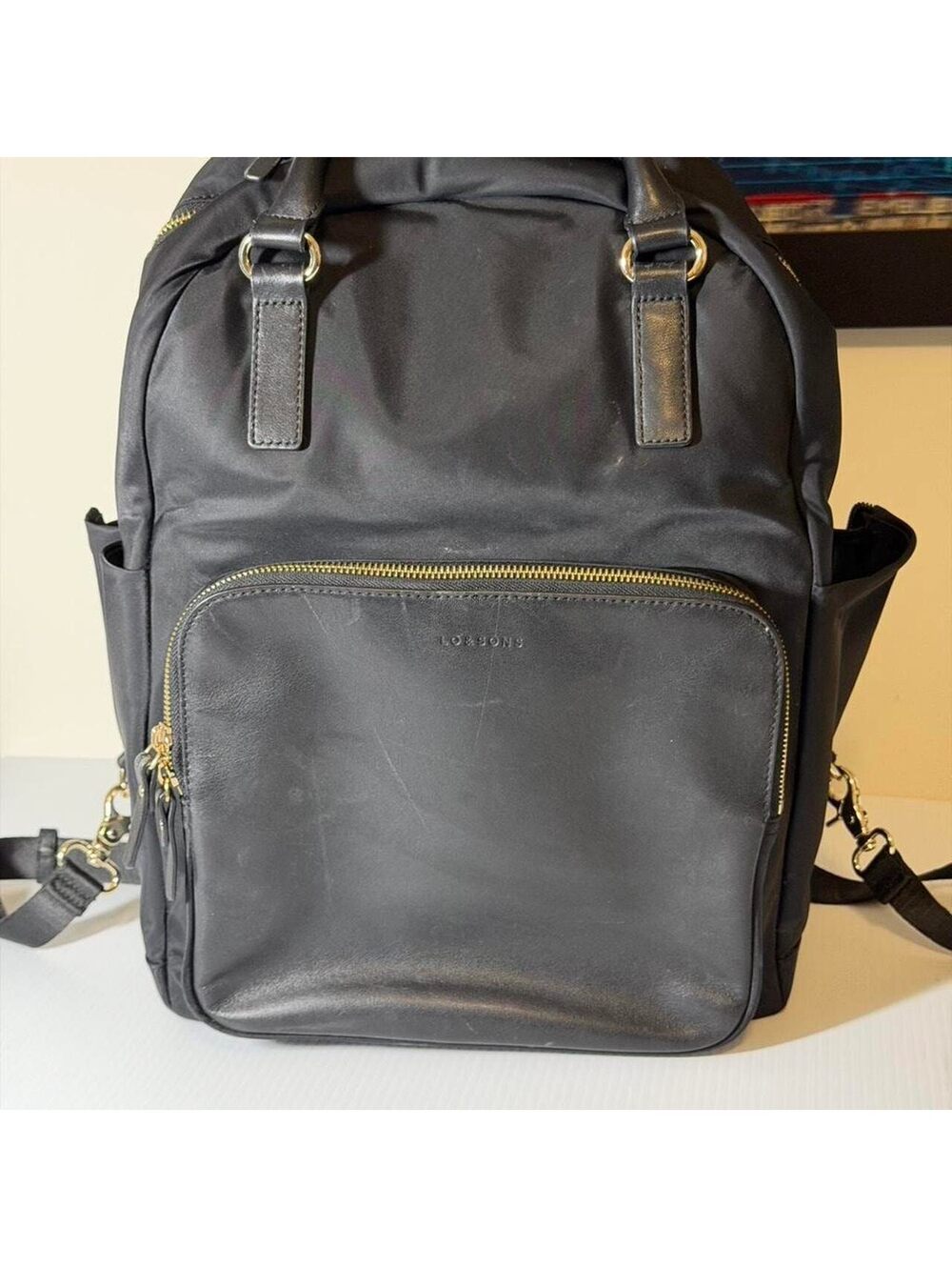 Lo & Sons Black Backpack with Gold Hardware